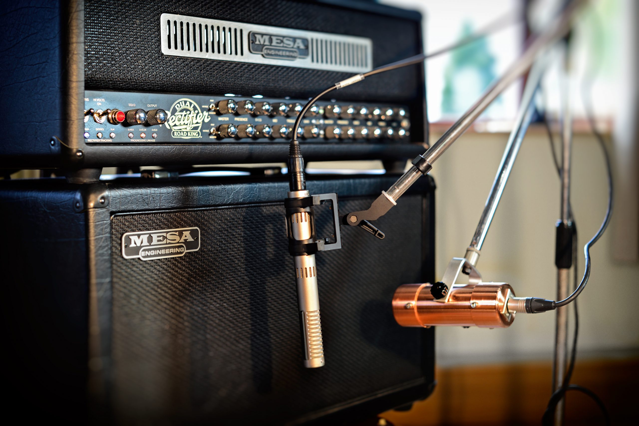 An amplifier and cables in the live room